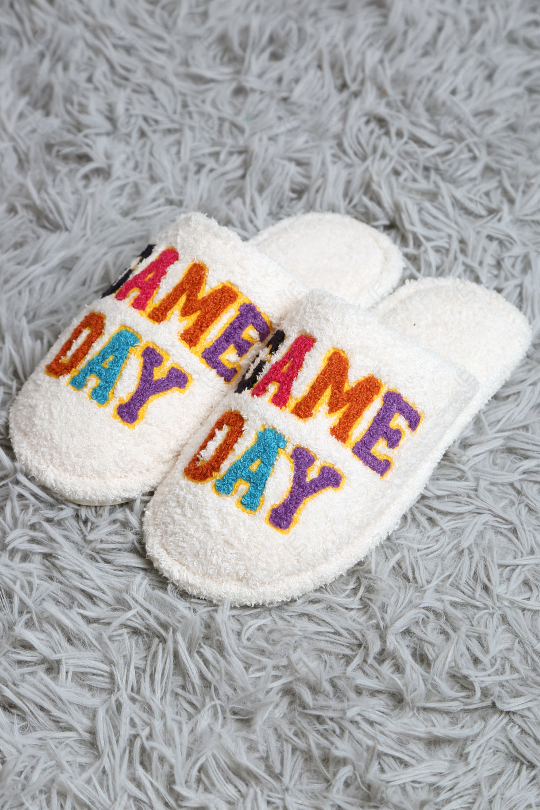 MULTI-COLORED GAME DAY PATTERN SLIPPERS SLIPPERS/SLIDES